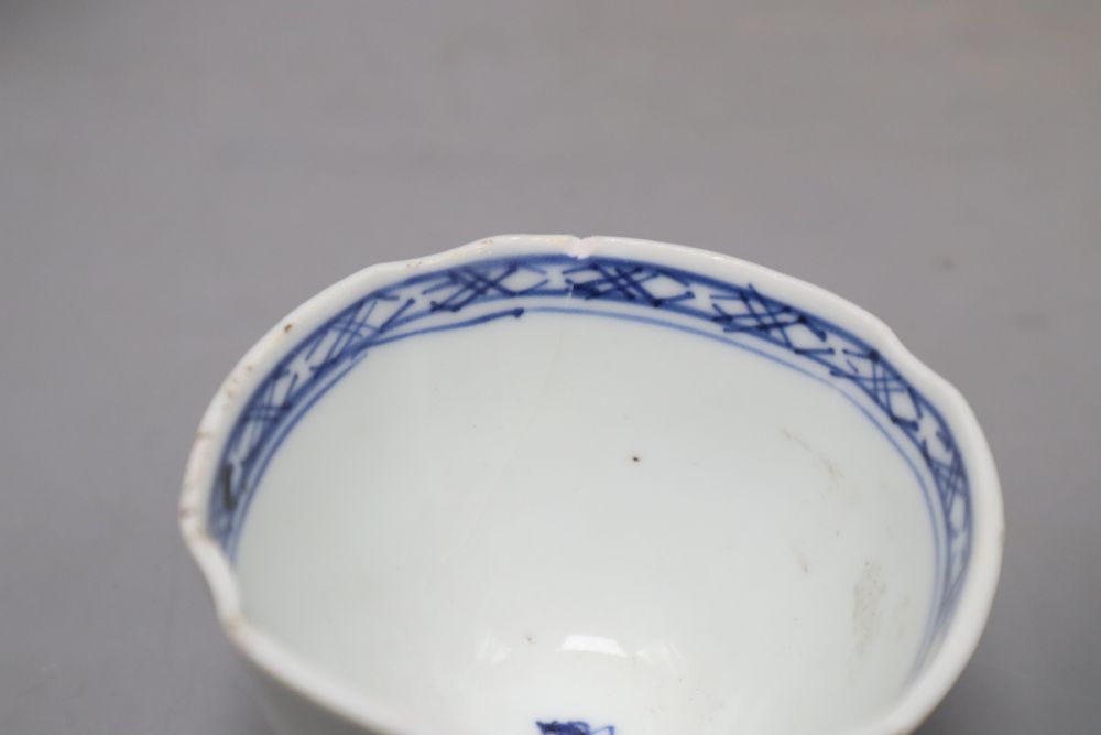 Two Chinese blue and white cups and a saucer, one with reign mark